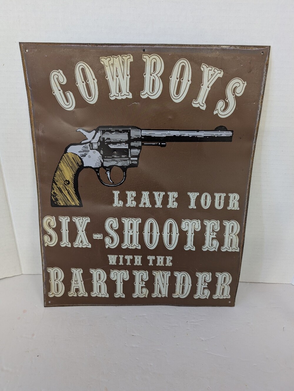 Vintage  Metal Bar Sign With Cowboys And Six Shooters.